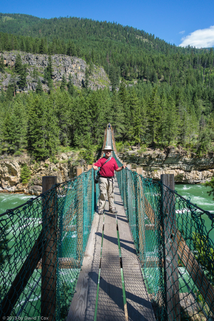 photographer on suspension bridge at Kootenai Falls, near Libby, MT ...